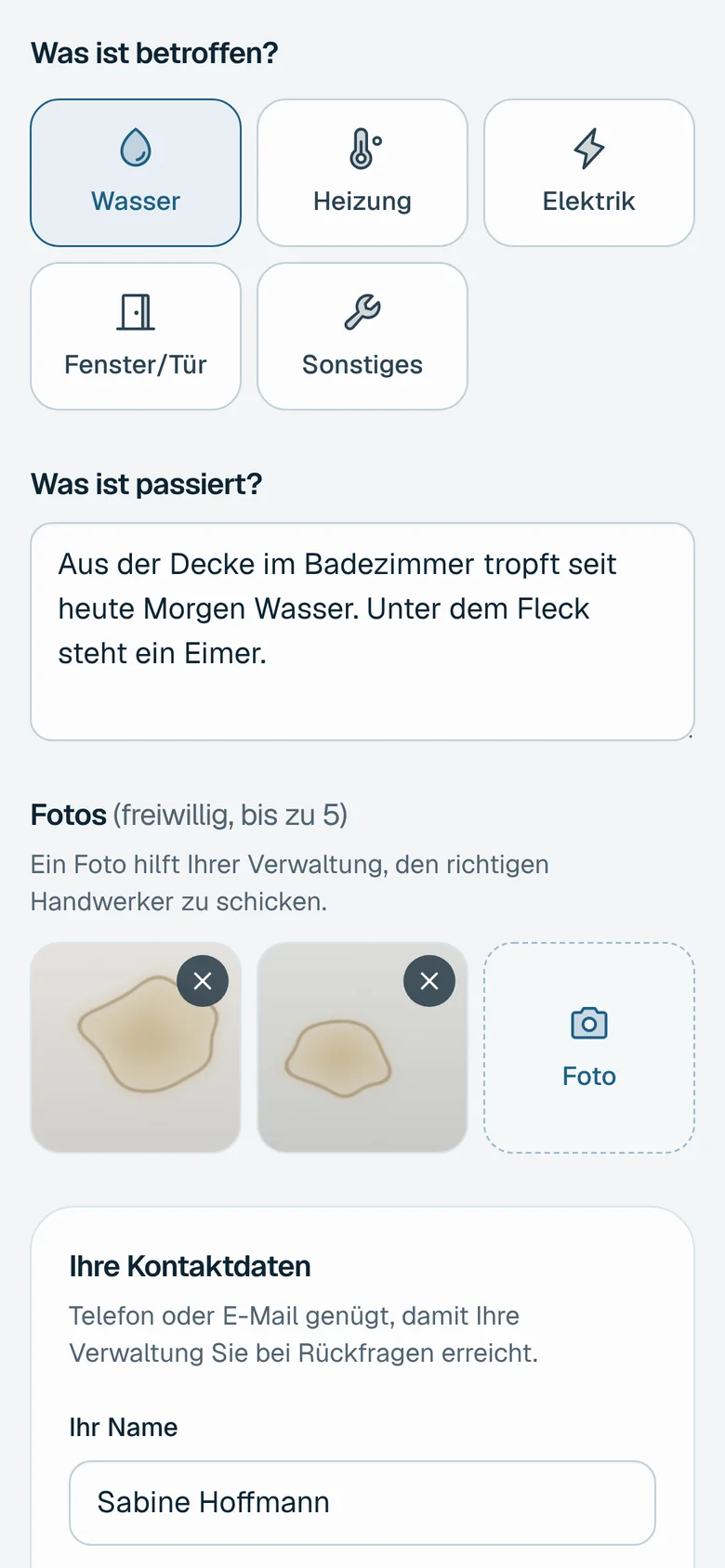 Meldeformular mit Beschreibung und zwei Fotos vom Wasserfleck